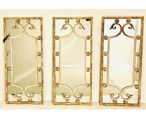 ARCHITECTURAL WALL MIRRORS, set of three, 112cm high, 48cm deep, regency style, aged white painted metal frames (3) 