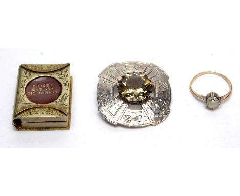 A Scottish silver and quartz brooch, by Robert Allison &amp; Son, Edinburgh 1960; a miniature dictionary in metal case; and a