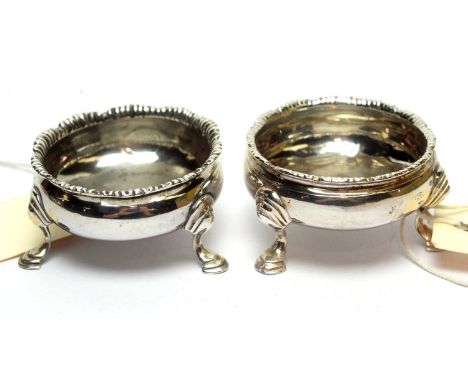 Two Georgian silver table salts, of cauldron form, one dated 1764, hallmarks worn. 