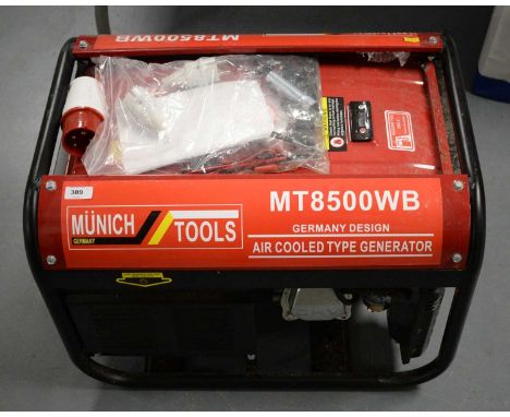 A German Munich Tools MT8500 air cooled type generator, petrol fuel, in red, 59 x 40 x 42cms high.