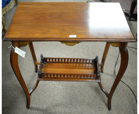 An Edwardian mahogany two-tier occasional table, 68 x 40 x 70cms.