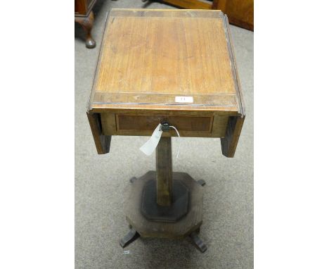 A Victorian-style walnut and banded work table, fitted a single drawer, on chamfered square section stem, octagonal platform 