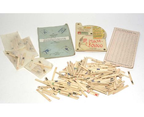 A bone Mahjong set, with booklet.