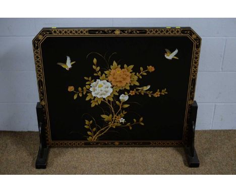 A late 20th Century Asian lacquered firescreen, decorated bird, foliage and bamboo design, 93 x 80cms high.