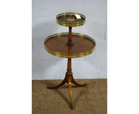 An attractive 20th Century inlaid mahogany two-tier occasional table, the graduated tiers with pierced brass galleries, on ta