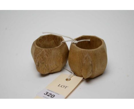 Robert ‘Mouseman’ Thompson: graduated pair of octagonal carved wood napkin rings, each with mouse motif decoration in high re