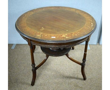 An Edwardian inlaid mahogany centre table, the circular moulded top with banded border decorated with inlaid leaf design, lea