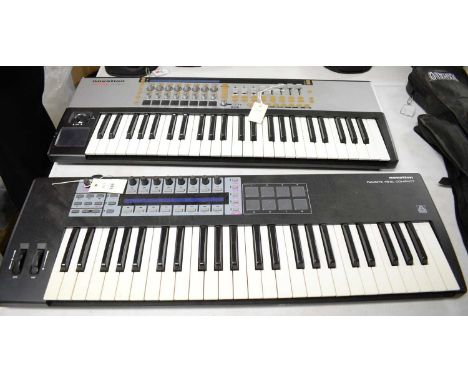 An Automap Universal Novation ReMote 49SL compact keyboard; together with a Novation 49SL MkII keyboard, each lacking wires. 