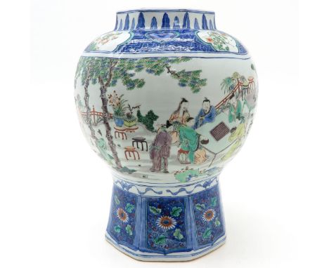 Blue border on top and bottom of vase with Famille Verte scene of Chinese men gathering at table playing games, 45 cm. tall.