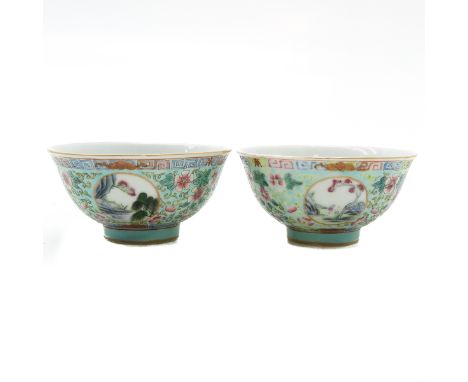 Light blue decor with Famille Rose enamels, marked with 4 characters on the bottom, 9 cm. in diameter.