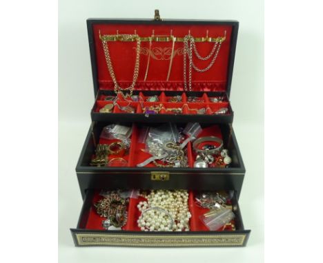 A collection of costume jewellery in contained in a gilt tooled jewellery box, jewellery including  an opal pendant, a silver