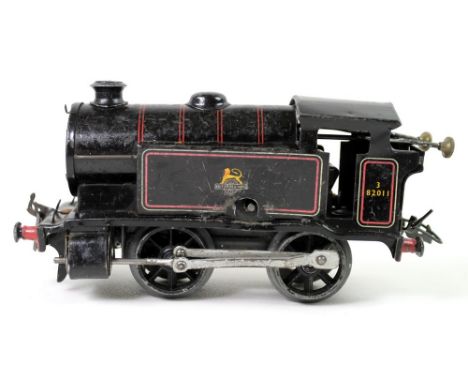 A Hornby O gauge clockwork tinplate train set, including an engine, with key, a boxed container (furniture), a boxed rotary t