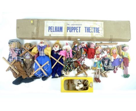 A group of five Pelham puppets, including Foal, boxed, together with a lightweight Pelham puppet theatre, boxed and eight fur