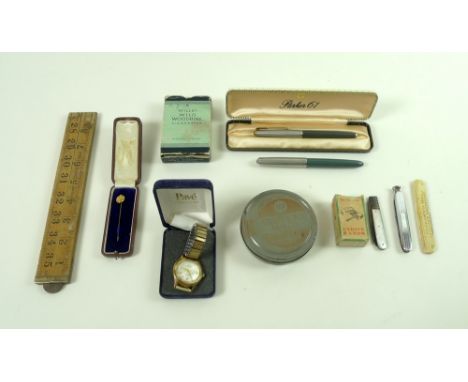 A collection of items including three pocket knives, a 15ct gold topped stick pin, two Parker pens, a selection of silver thr