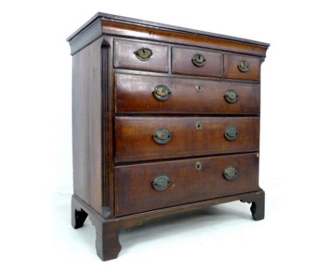 A George III mahogany and crossbanded chest of three drawers, previously the top section of a tallboy with later surface adde