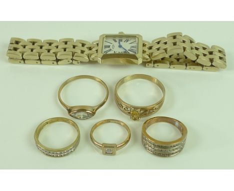 A group of five 9ct gold rings comprising a ring banded with three rows of diamonds, size M, 4.2g, a ring set with cubic zirc