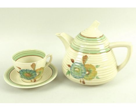 A Clarice Cliff for Newport Pottery tea set, decorated in Honeydew pattern, Lynton shape, comprising six cups, 10.8 by 6.5cm,