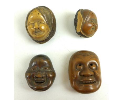 A group of four Japanese netsuke, two carved from tagua nuts as old women, each with two-character signature, 4.5 by 3.8 by 3