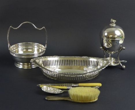 A selection of silver including an Edwardian marquise or boat shaped fruit bowl, the pierced sides with chased and embossed f