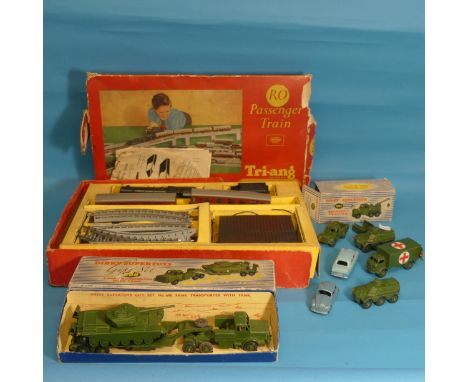 A collection of Dinky Toys: a boxed car carrier and trailer no.983, a boxed tank transporter and tank no.698, and a boxed rec