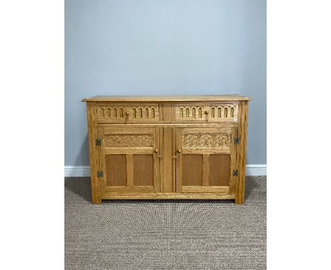 A light oak Old Charm-style Sideboard, with incised decoration, comprising two drawers above two doors, W 146cm x H 85cm x D 