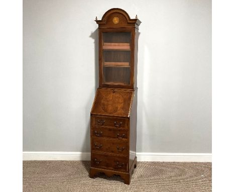 An reproduction inlaid small Bureau Bookcase, of small proportions, the fall front opening to reveal a fitted interior, above