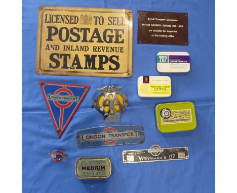 London Transport enamel Signs, two vintage London Transport red/blue/grey enamel signs, a London Transport enameled cap badge