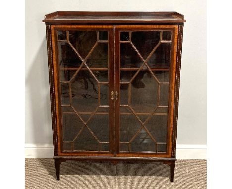 An Early 20thC Inlaid Display Cabinet, with three adjustable shelves behind glazed doors, damage to glass on one door, on bra