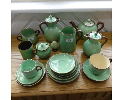 A Torquay pottery part Tea Service, including Cream Jugs, Tea Cups, etc, together with a studio pottery tray and two Cruet Se