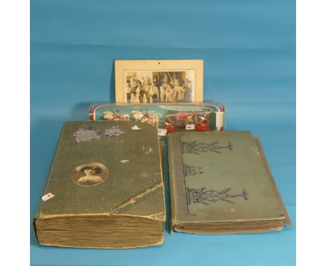 Two early 20thC Postcard Albums, containing UK and Devon topography and greetings cards, together with silk and embroidered p