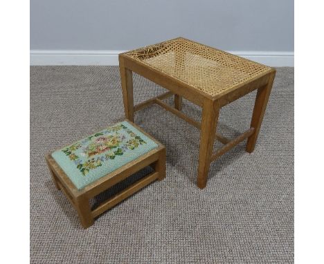 A mid-20th century limed oak Footstool, with drop-in wool-work upholstered seat pad, impressed mark 'W', together with a lime