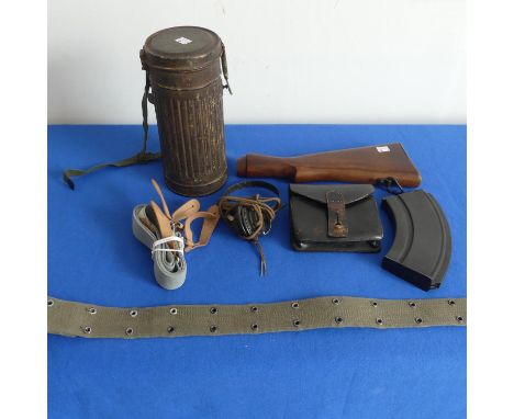 A collection of WWII Militaria items, Comprising a German WW2 period Gas Mask Canister, a French WW1 period leather ammunitio