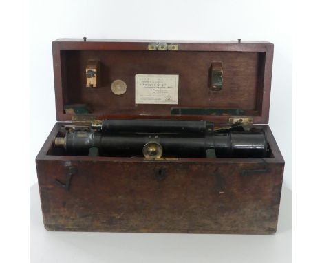 A Vintage Theodolite, by A.G.Thornton Manchester, in fitted transport case with wooden tripod and a wooden surveyors staff. (