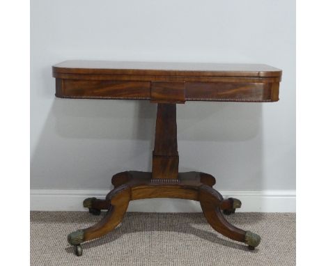 A William IV rosewood Card/Tea Table, of rectangular shape, the swivel fold-over top opening to reveal green baize inset, the