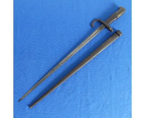 A French Gras Bayonet, the 52cm straight T-shaped steel blade marked ?Mre d?Armes de St.Etienne Janvier 1878?, in blacked ste