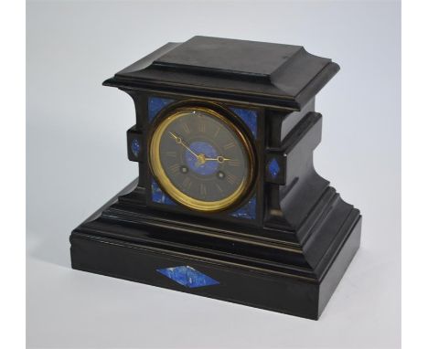 A late 19th century lapis mounted slate mantel clock, the 8-day two train movement striking the hours and half hours on a bel