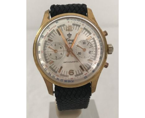 A Chronograph 21 prix antimagnetic watch by Ling in gold coloured case. Tachymeter/telemeter dial with raised batons. On blac