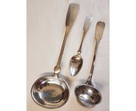 A large German 12 loth ( 750 ) silver ladle and a 12 loth serving spoon. Together with a German silver plated ladle marked Se