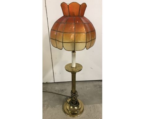 A vintage brass based table lamp.  Approx. 76cm tall to top of shade.