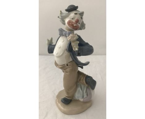 A Nao figure " Flower For My Lady " gentleman clown holding a flower # 488. Unboxed. Approx  height 21cm.