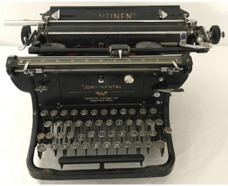 A vintage German Continental typewriter by Wanderer-Werke. German text translates to " Property of the Railcar and Wagon Fact