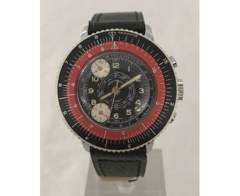 A Lucerne sports chronograph calculator wristwatch with red and black bezel. On black leather strap. 