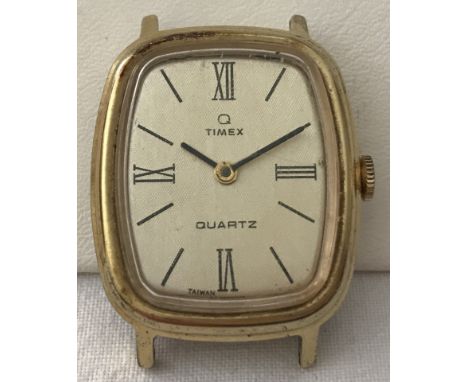 Timex electronic quartz square shaped watch head in gold tone case.  