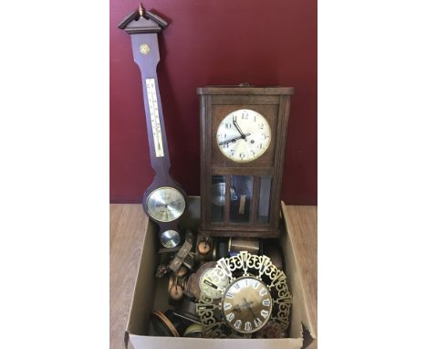 A box of mantle clocks, a wall clock and a barometer.  