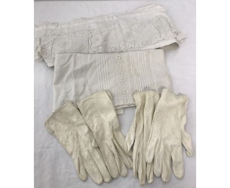 A small collection of vintage embroidery and lace fabric together with 2 pairs of white kid gloves.  