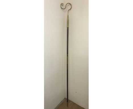 A vintage wooden and brass Bishops crosier with hooked finial.  Approx. 181cm tall.