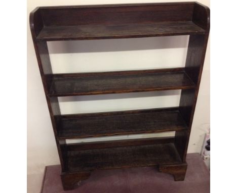 A dark oak open backed 4 shelf bookcase.  Approx. 82 x 114cm.