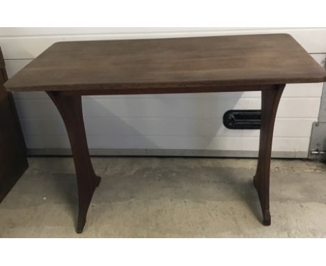 A vintage dark wood refectory style table.  Approx. 110.5 x 107cm x 76cm tall.