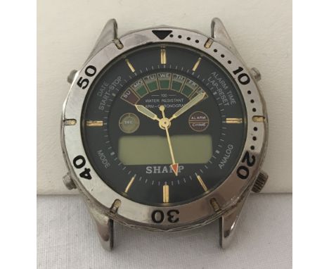 An early Sharp electronics watch by the inventor of the LCD calculator panel Tadashi Saski. Chronograph digital display, wate