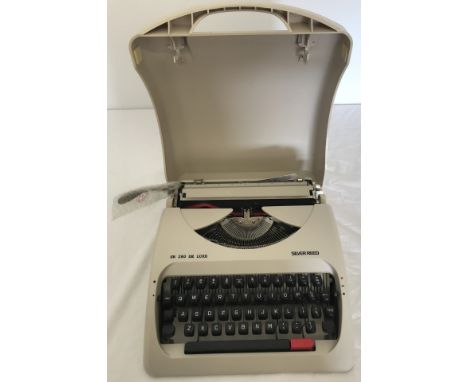 A boxed vintage Silver Reed typewriter.  